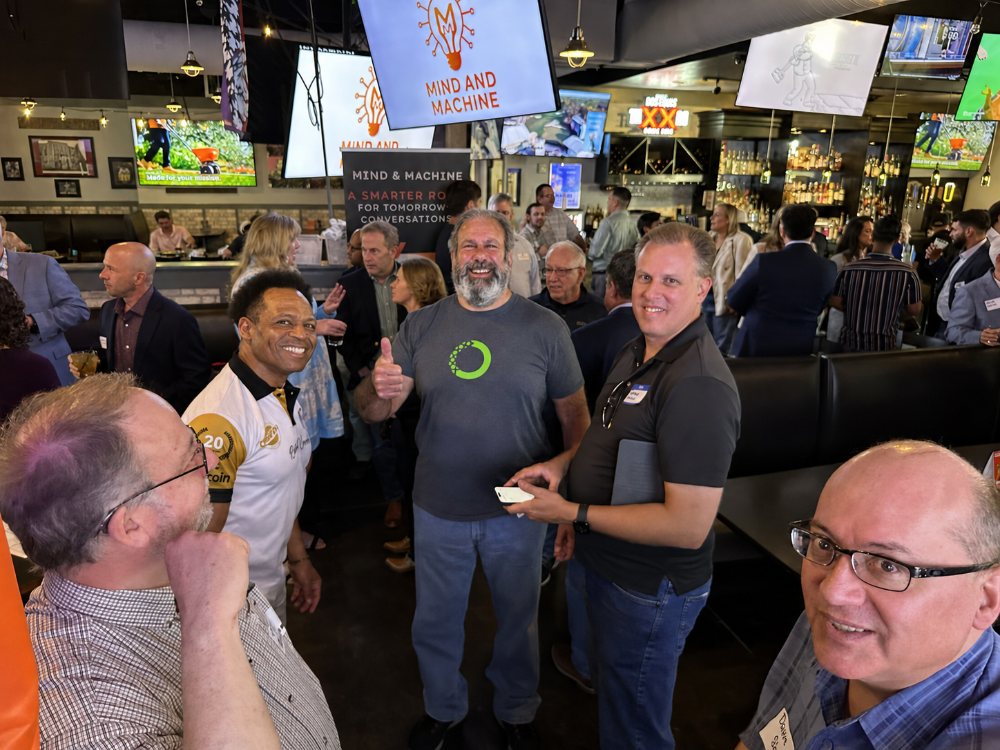 Attendees mingling at a Mind & Machine DFW event