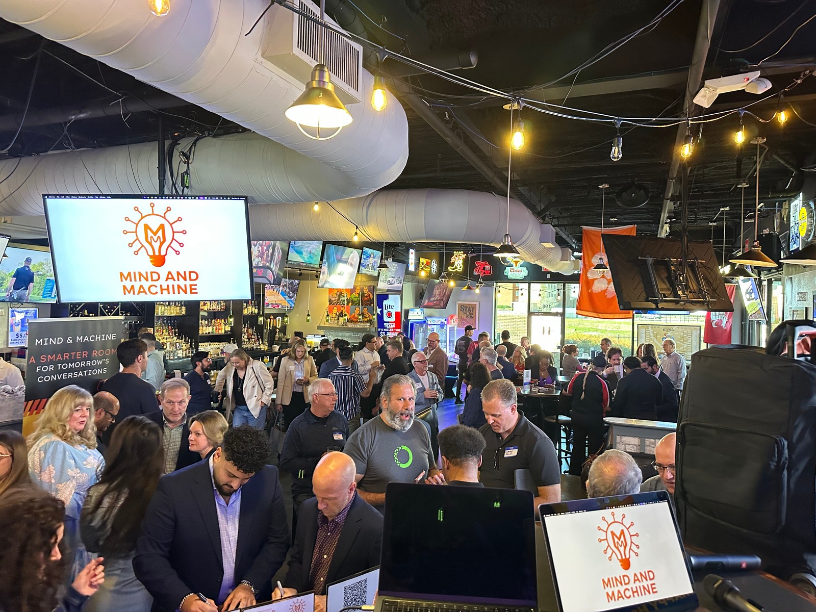 Check-in table at a Mind & Machine DFW event