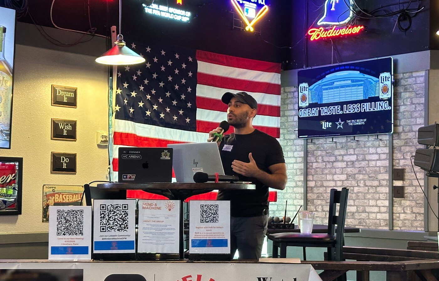 Speaker on stage at a Mind & Machine DFW event